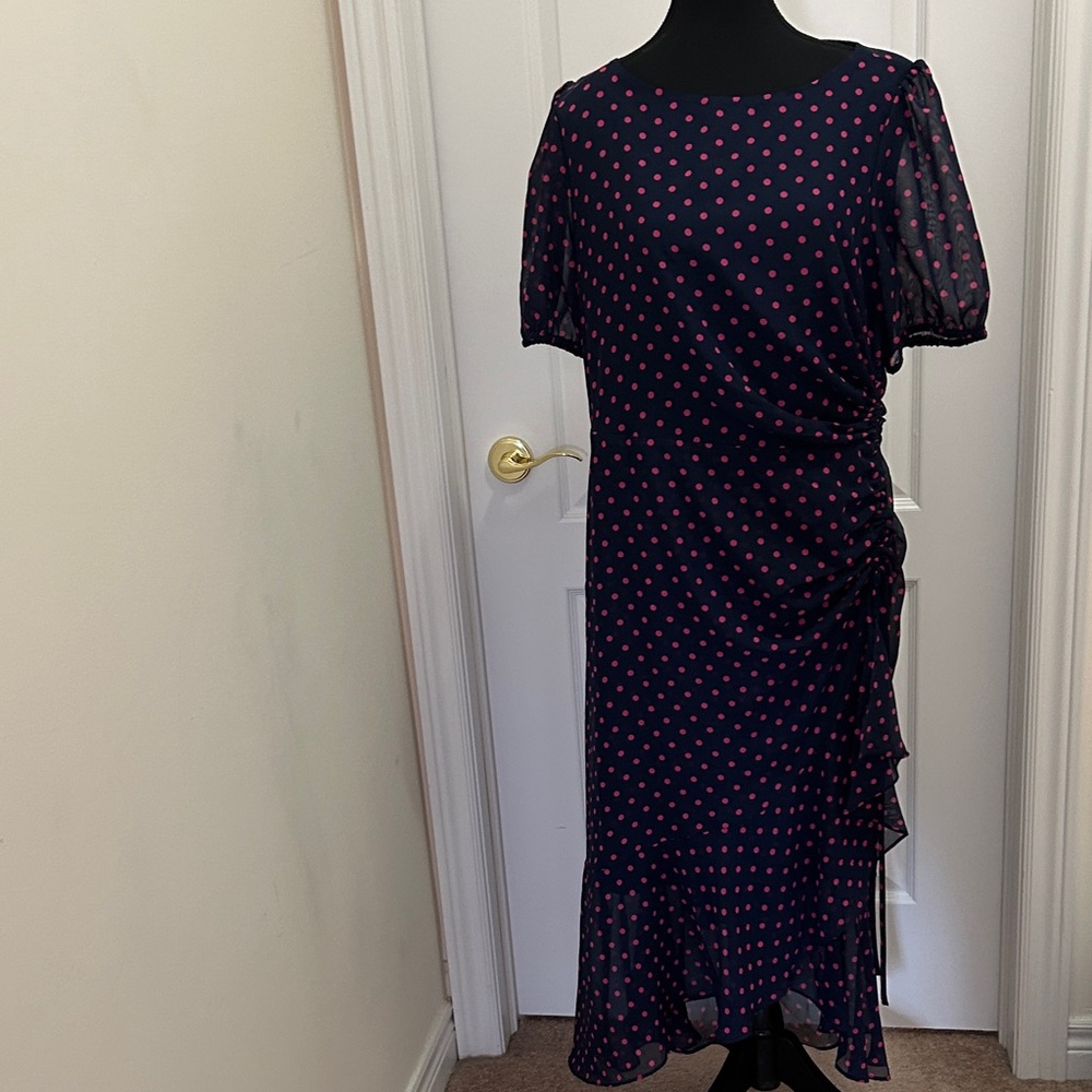 Navy Midi Dress with Pink Polka Dots and Ruffle Detail.